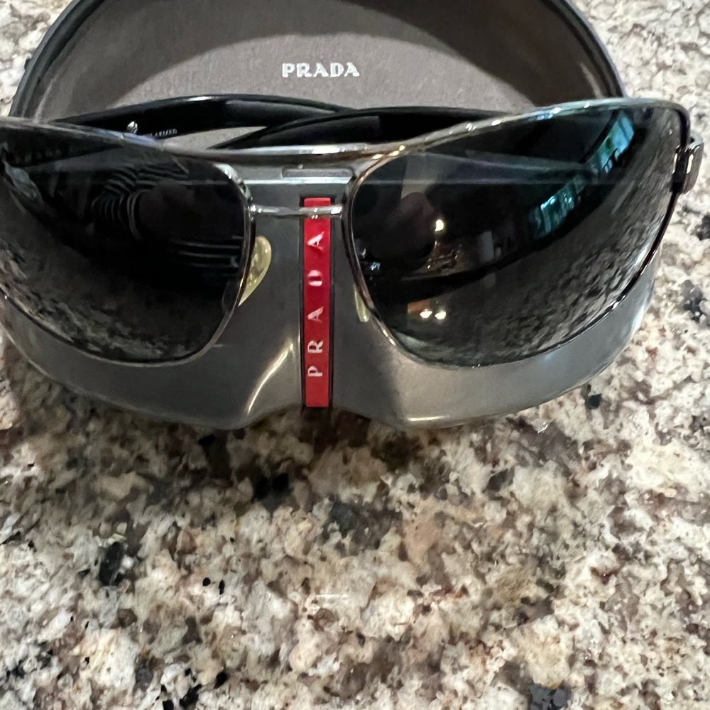 Prada Men's Sunglasses with Silver and Red Details